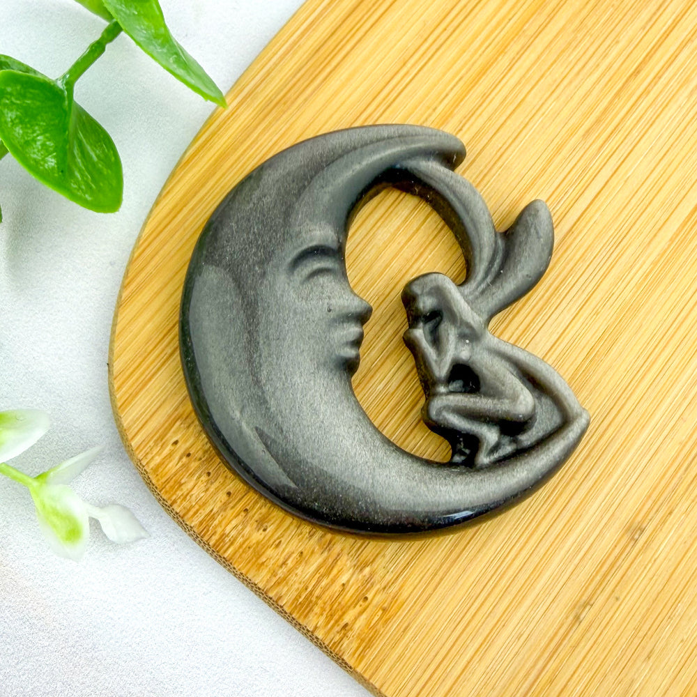 fée sur lune en obsidienne argentée
