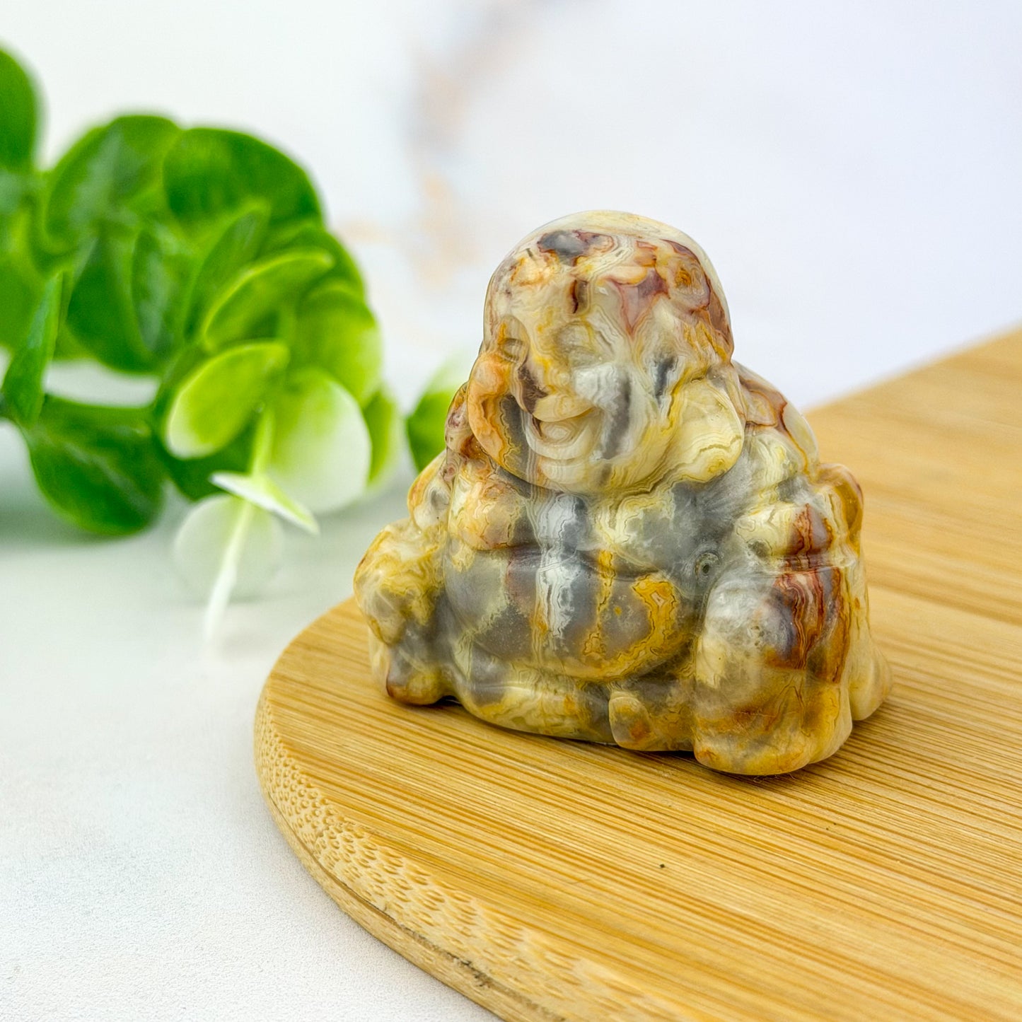 Bouddha rieur en agate folle jaune