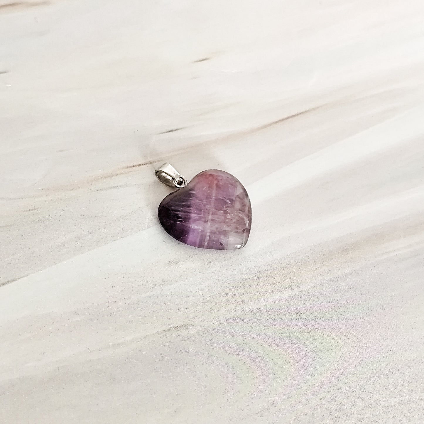 pendentif coeu en améthyste