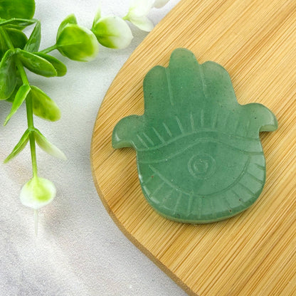 main avec œil protecteur en aventurine verte