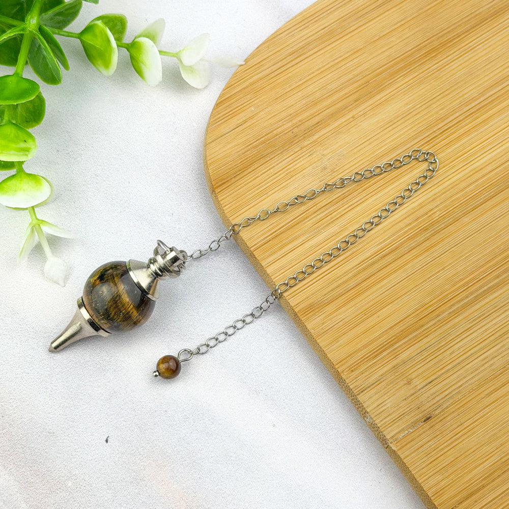 pendule boule en œil de tigre