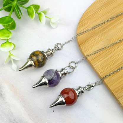pendule boule en pierre naturelle